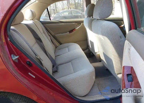 2004 Toyota Corolla Le z USA, uszkodzony, nr VIN JTDBR32E842016868